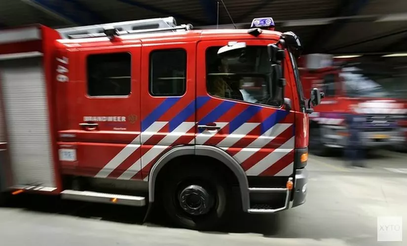 Brand op dak Amsterdams Lyceum: brandweer rukt groots uit