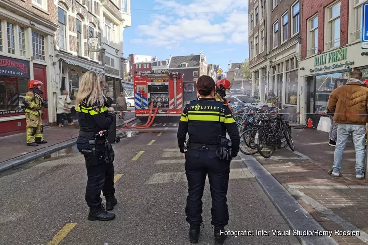 Brand in winkel Haarlemmerstraat