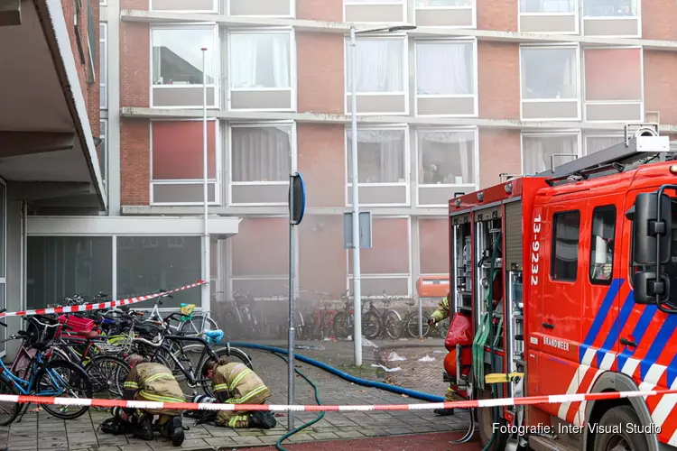 Brand in flat in Amsterdam-Sloterdijk, flat bewoners geëvacueerd