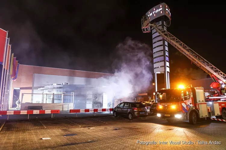 Ramkraak en brandstichting bij zaak in Amsterdam