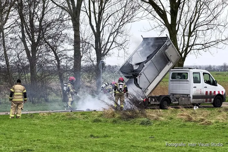 Brand in kleine vuilniswagen in Amsterdam